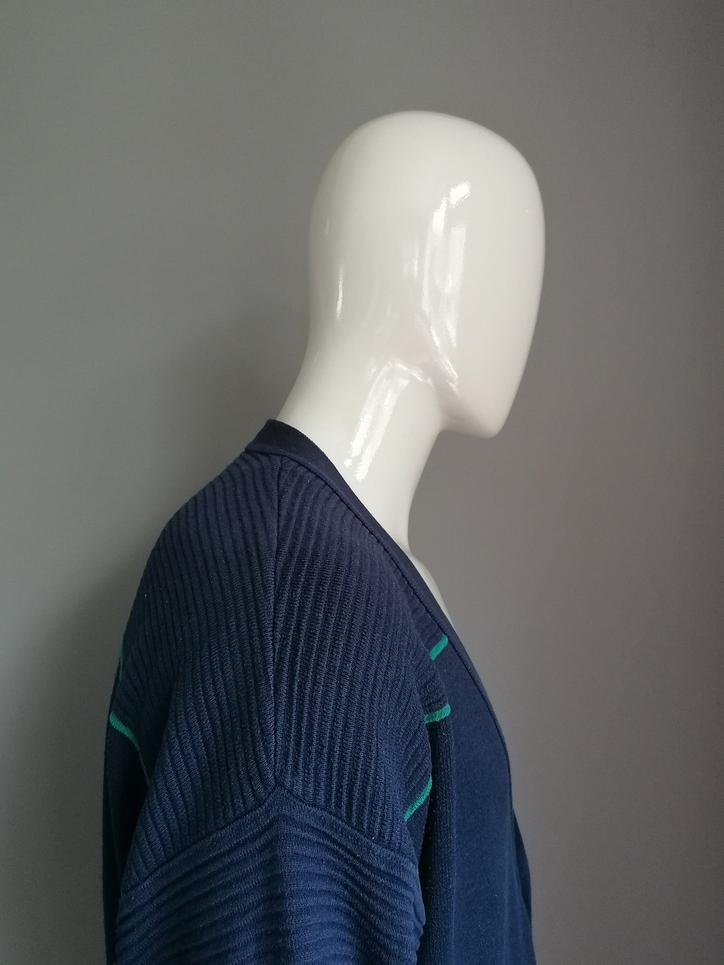 Vintage cardigan with buttons. Dark blue colored. Size XXXL / 3XL