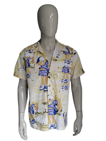 Cockers vintage camisa de manga corta. Impresión azul amarilla. Talla L.