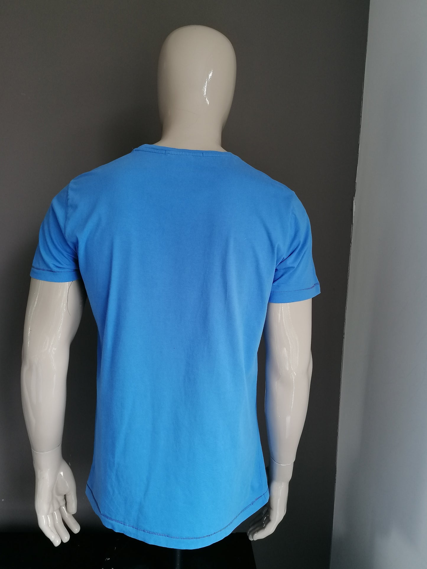 Ryan & Lewis shirt. Blue with print. Size XL.