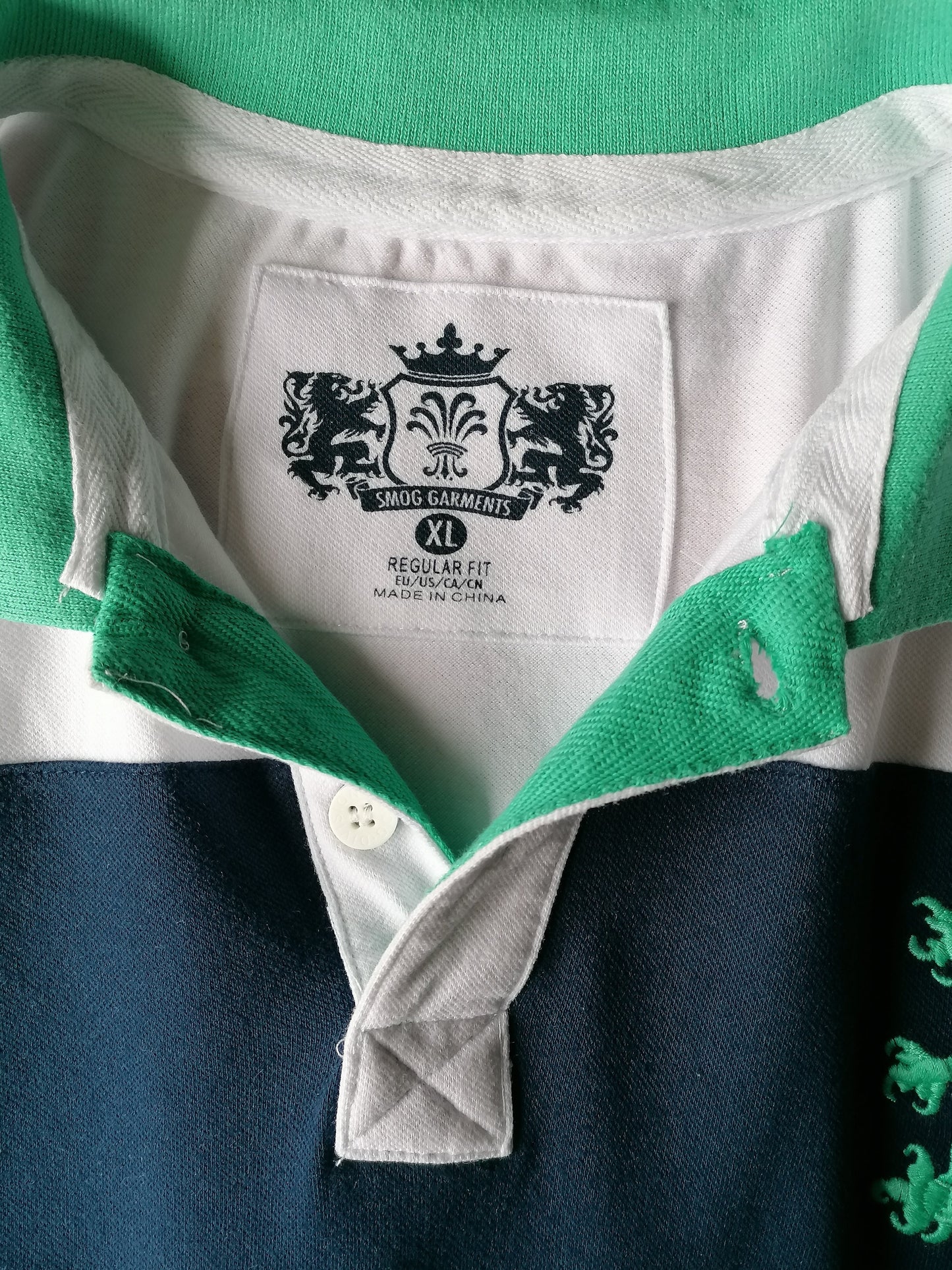 Smog Polo. Blue white colored green. Size XL. Regular fit.