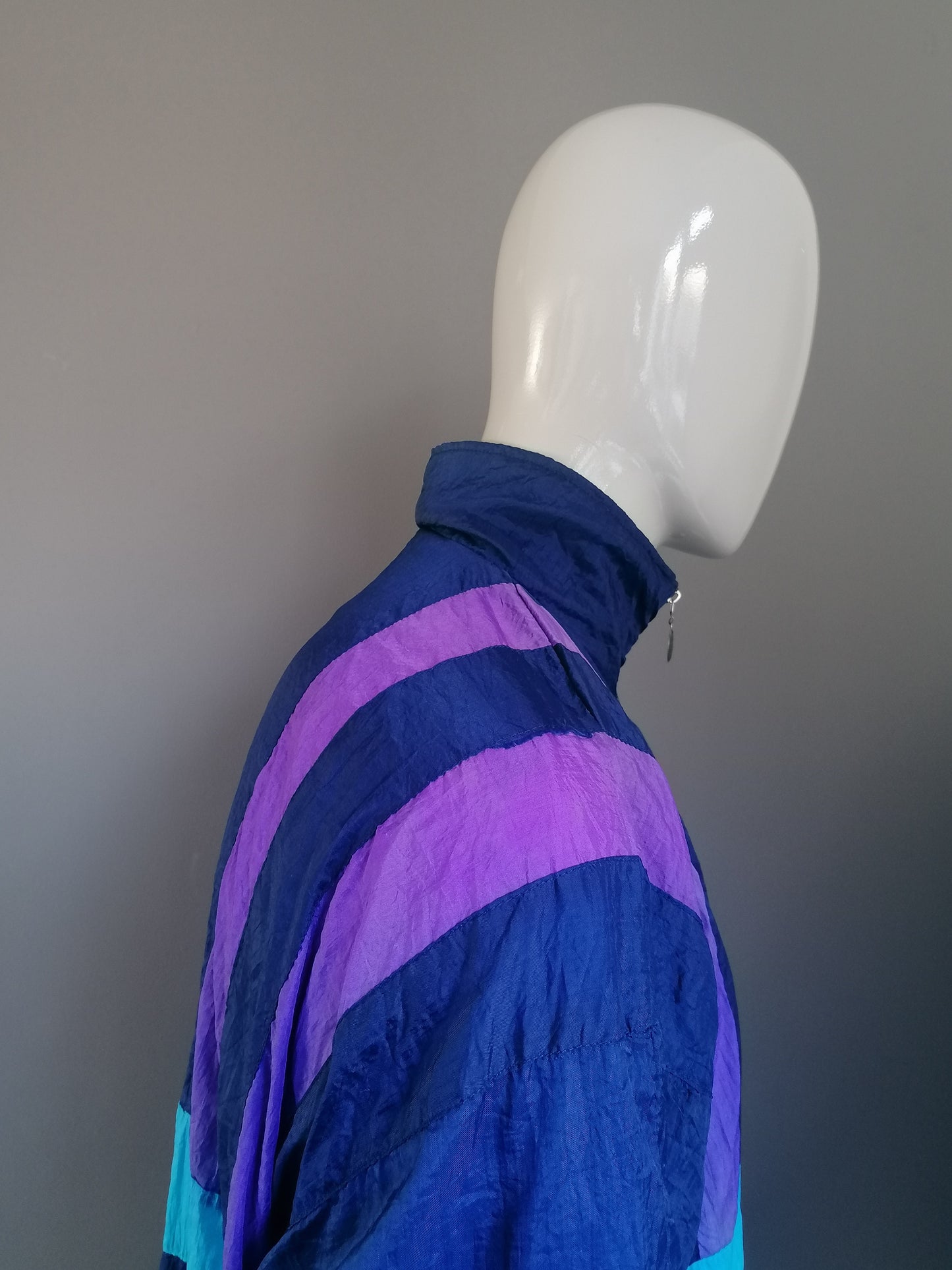 Vintage retro competition windbreaker. Lightly lined. Blue purple colored. Size XXL / 2XL