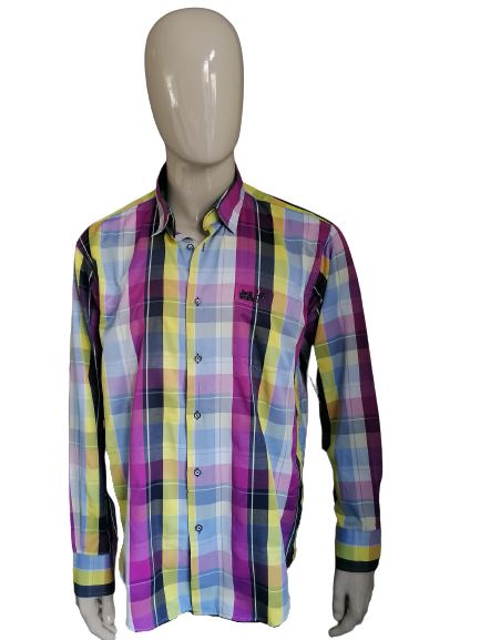 Jack Wolfskin shirt. Pair of yellow blue checkered. Size XL.
