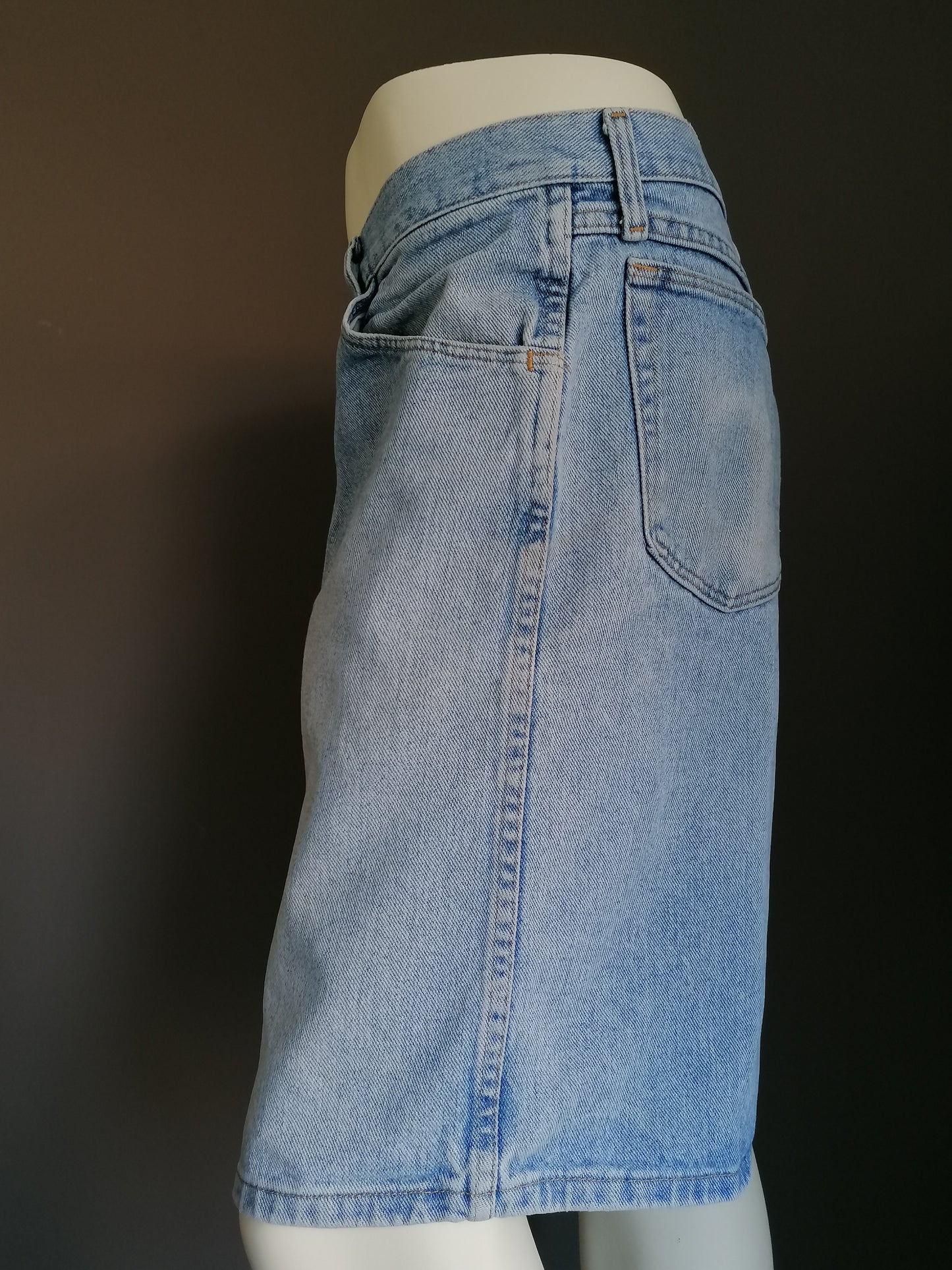 Wrangler jeans shorts. Colored light blue. Size W40.