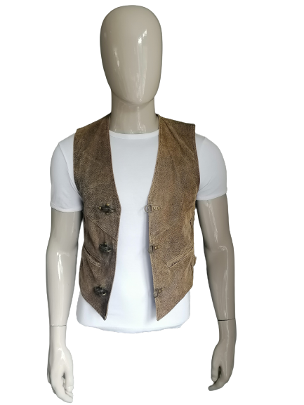 Tough ramatex vintage leather biker waistcoat with beautiful applications and buckles. Brown colored. Size S.
