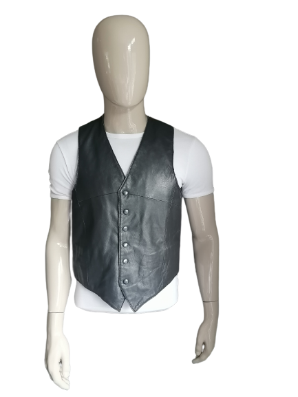 Kiliwatch leather waistcoat with press studs. Gray colored. Size L.