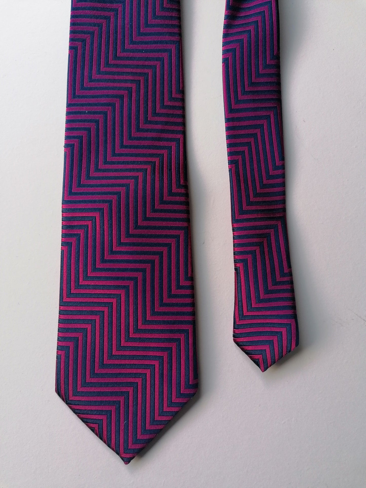 McGregor Distinction are tie. Purple blue motif.