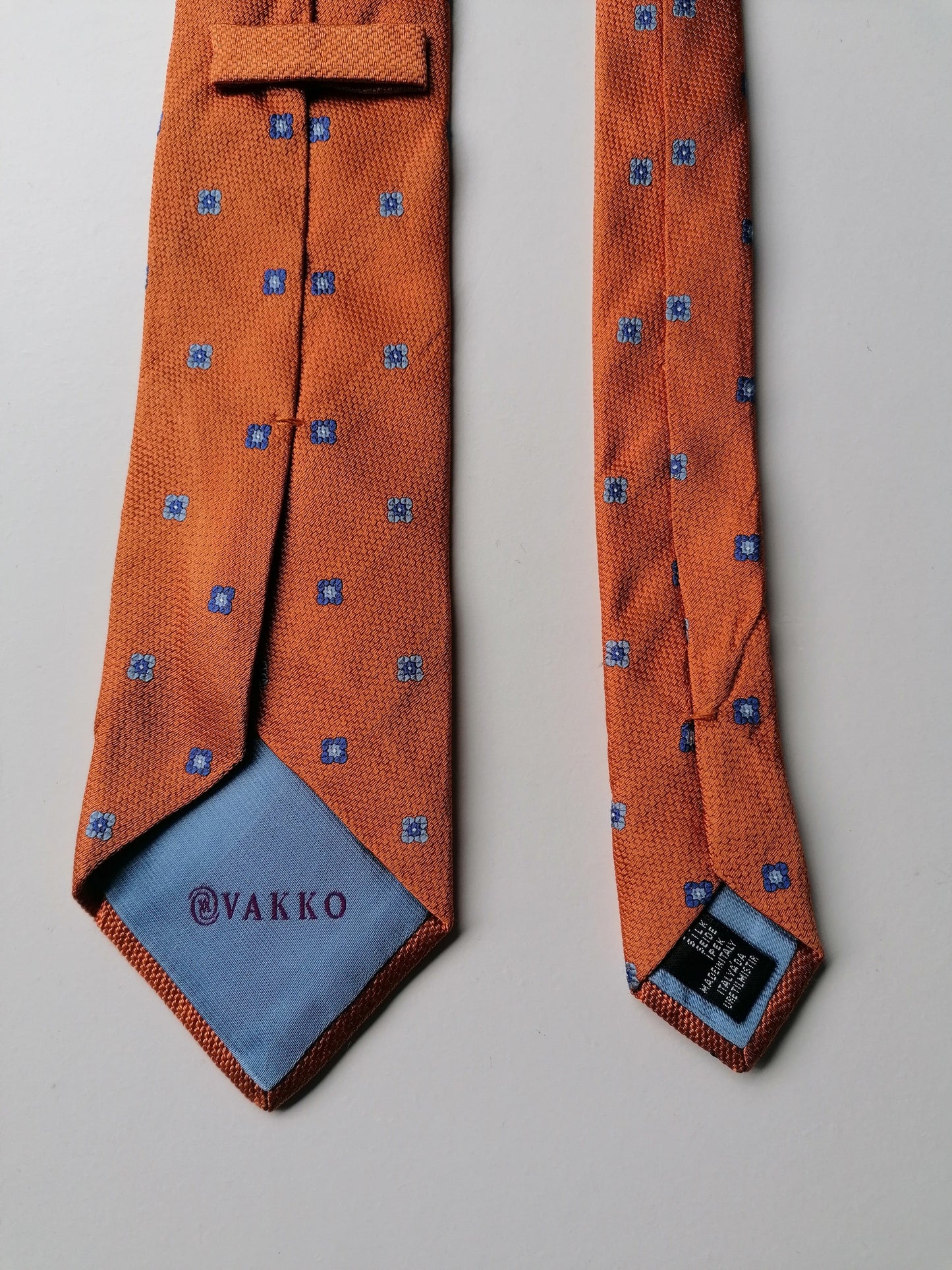 VAKKO Zijden stropdas. Oranje Blauw gekleurd.