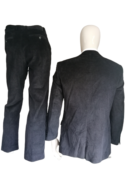 Disfraz de costilla de piedras. Bonita costilla. Color negro. Tamaño 48 (chaqueta) y talla 46 (pantalones)