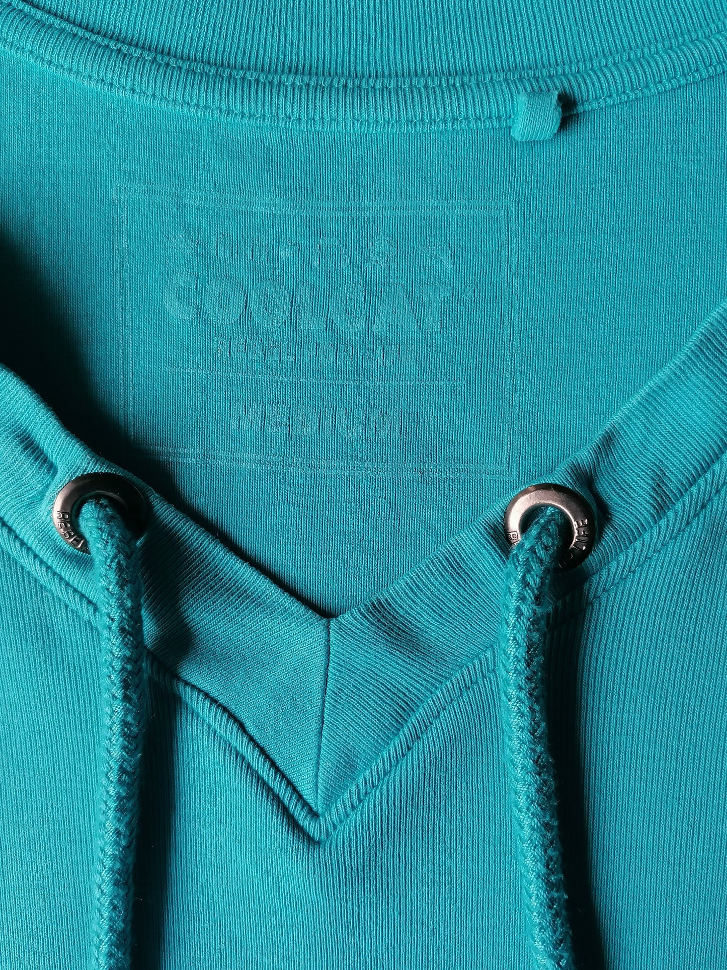 Coolcat-Hemd mit V-Ausschnitt und Saiten. Blau gefärbt. Größe M.