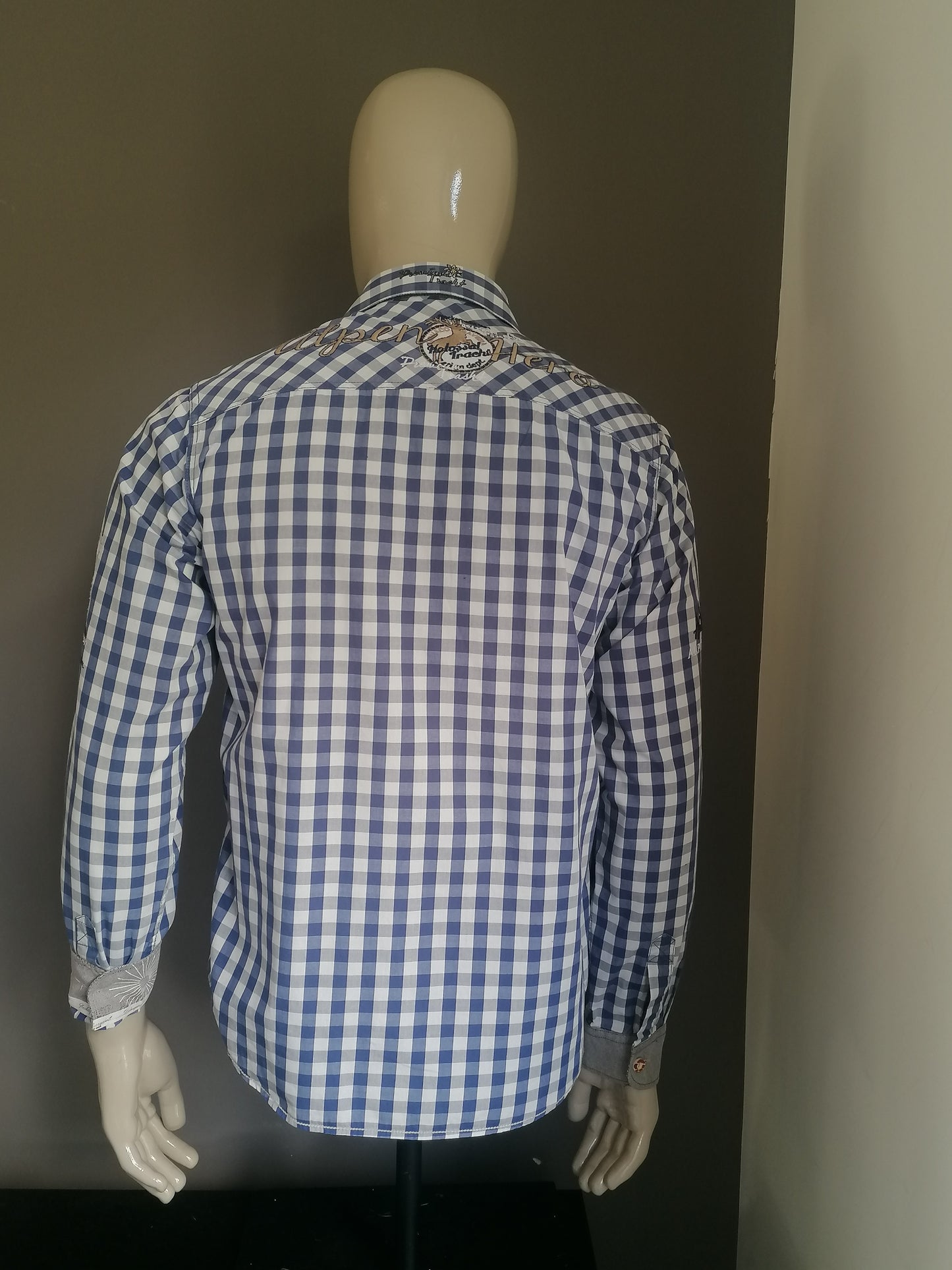 Stockerpoint shirt. Blue white blocked with applications. Size M.