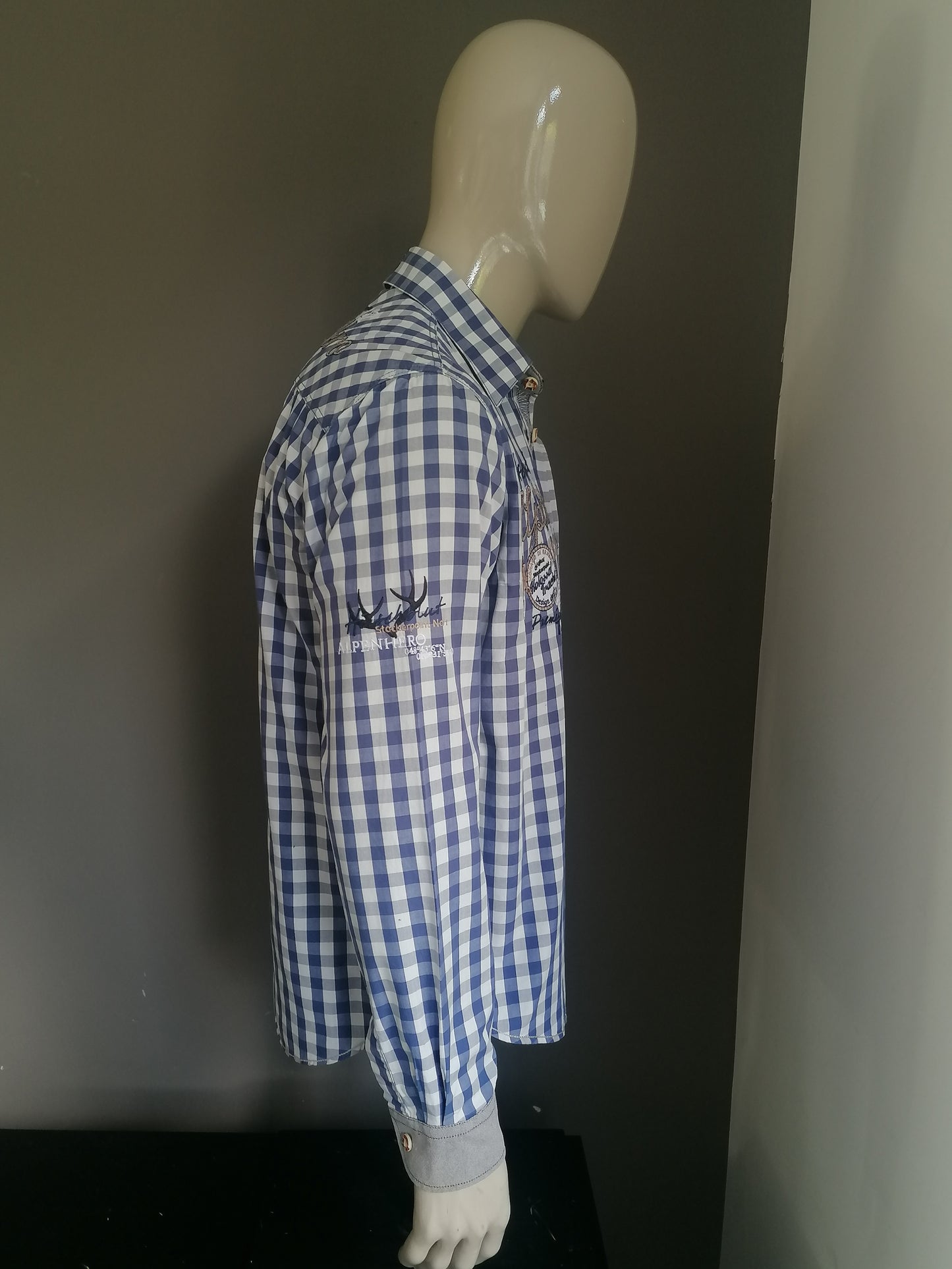 Stockerpoint shirt. Blue white blocked with applications. Size M.
