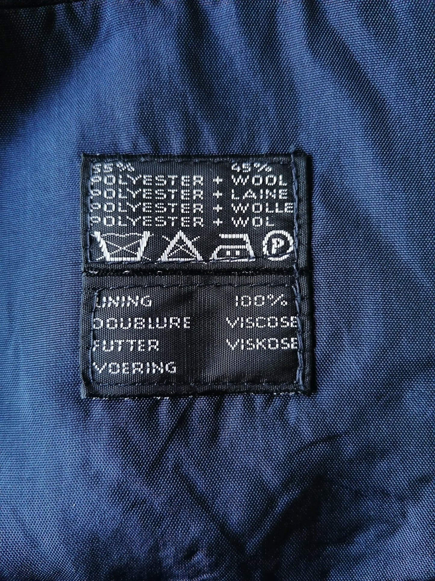 Disfraz de lana vintage. Color azul oscuro. Tamaño 56 / xl.