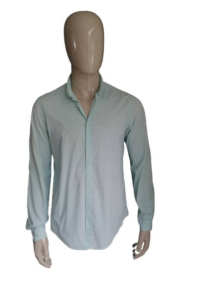 Camisa de Zara Man. Color verde claro. Tamaño L. Fit Slim.