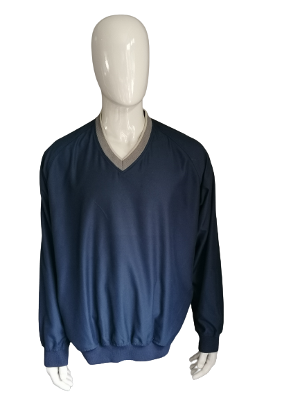Ashworth Golf Wind & Waterproof Sweater. Scollo a V. Blu scuro. Dimensione XL / XXL.
