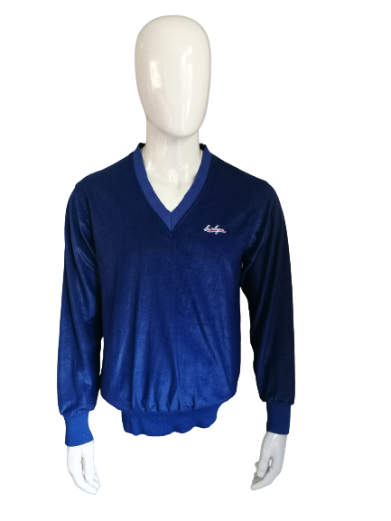Ben Hogan Velours / Pull en velours avec col en V. De couleur bleu foncé. Taille L.