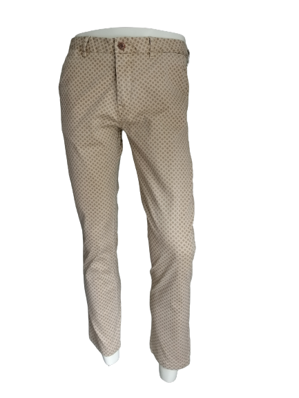 Hose von Scotch & Soda. Beige-braun-grauer Druck. Größe B31 - L30. Stuart-Typ. ordentlich gekürzt.