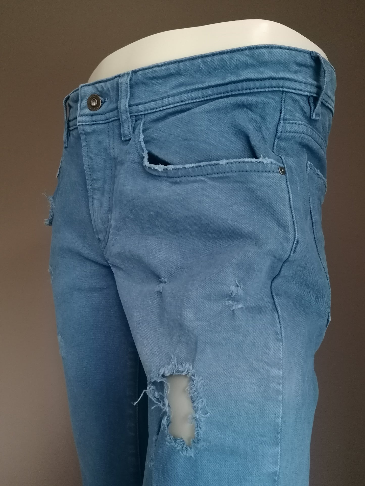 Jeans strappato PGT. Colorato blu. Taglia W32 - L32.