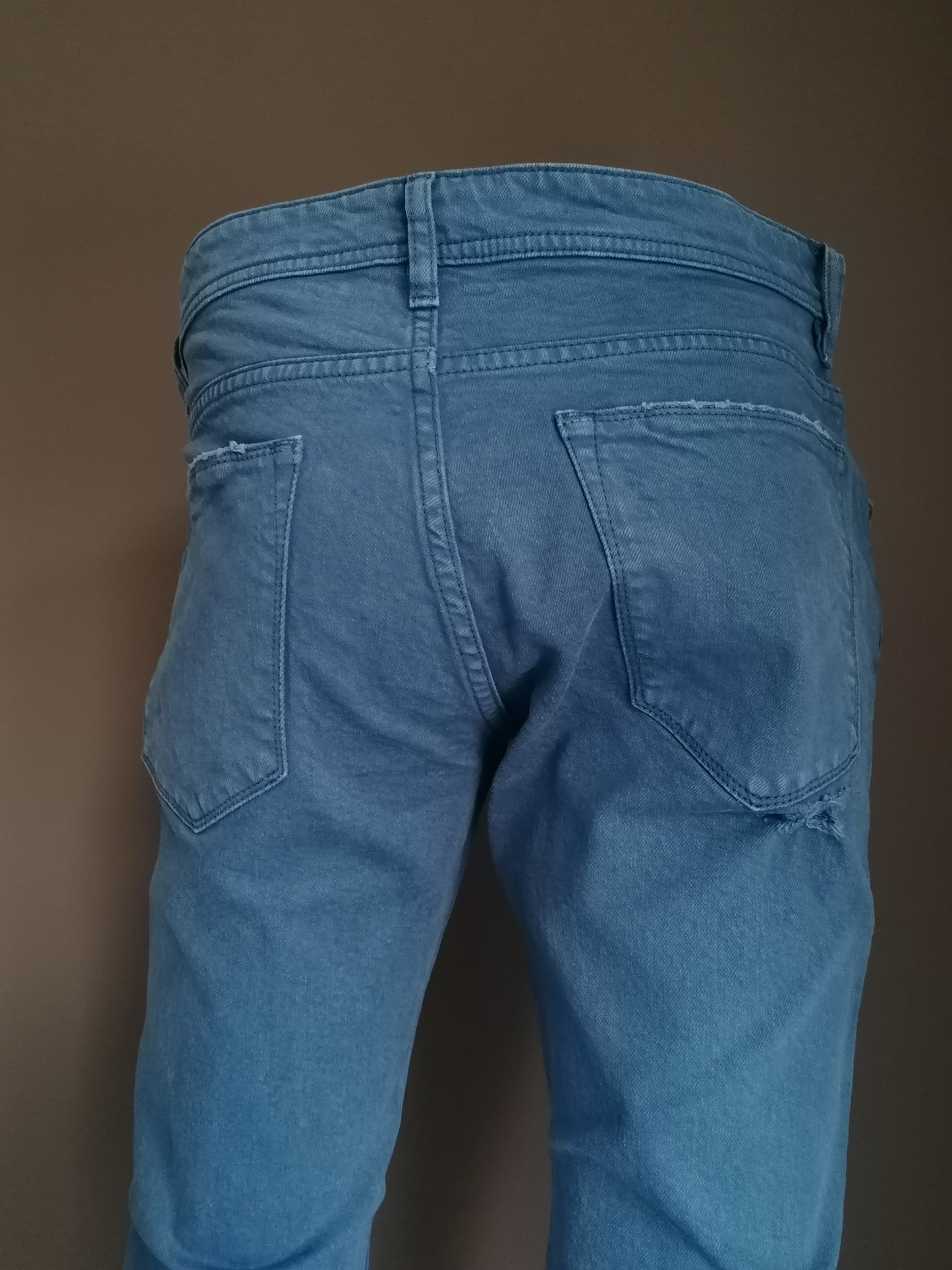 PGT Ripped Jeans. Couleur bleue. Taille W32 - L32.