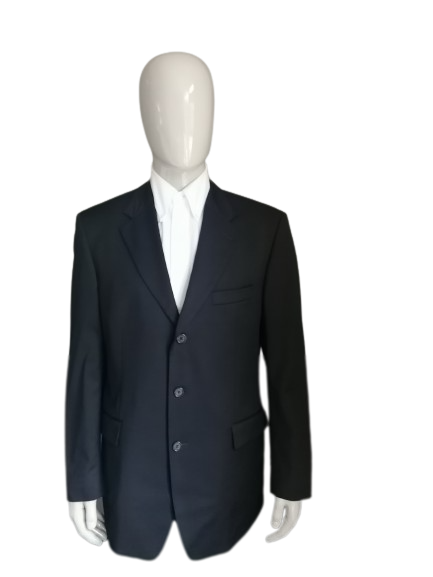 Hugo Boss woolen jacket. Dark blue colored. Size 54 / L.