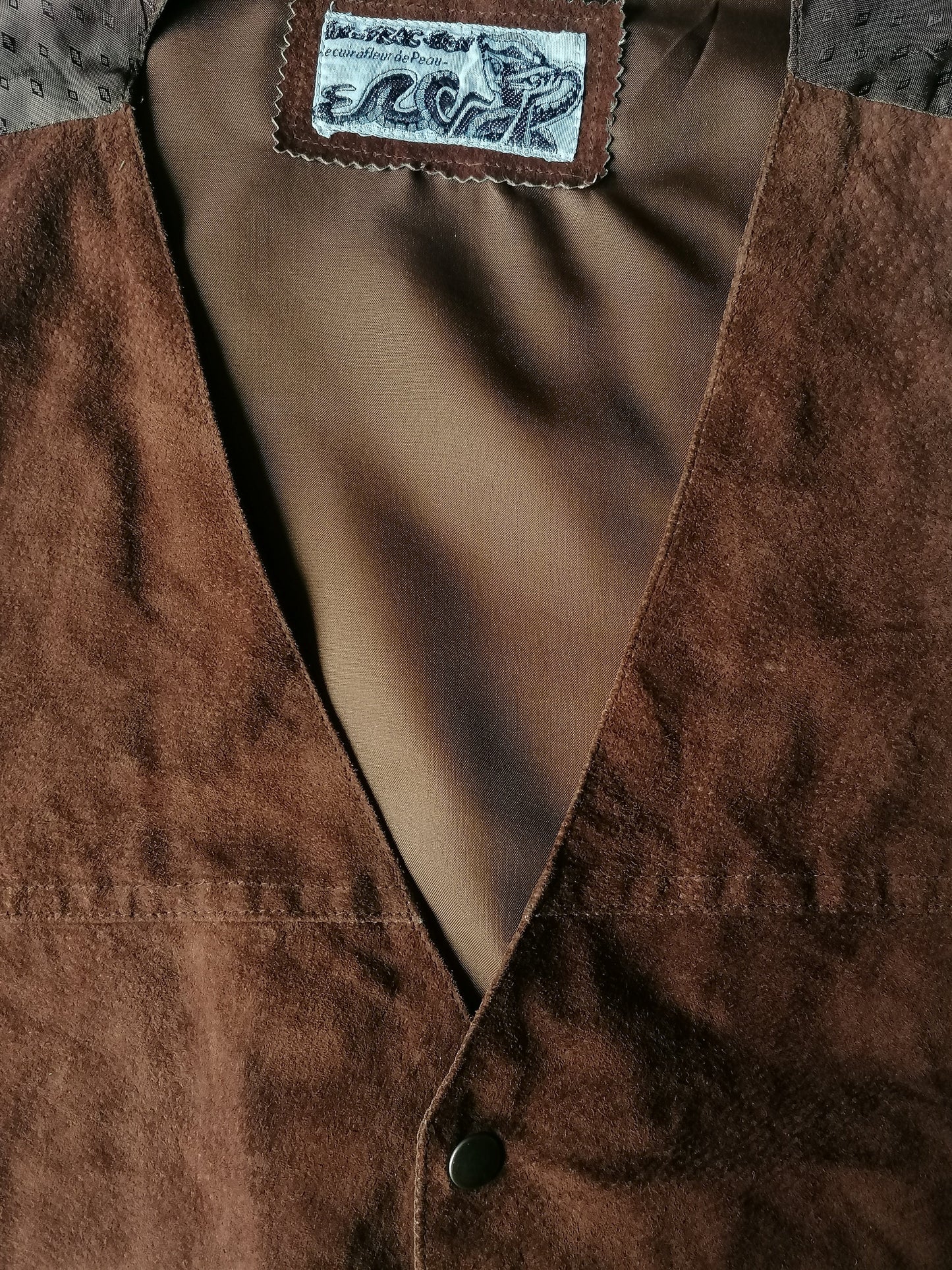 In-Frac-Tigs leather waistcoat with press studs. Brown colored. Size M.