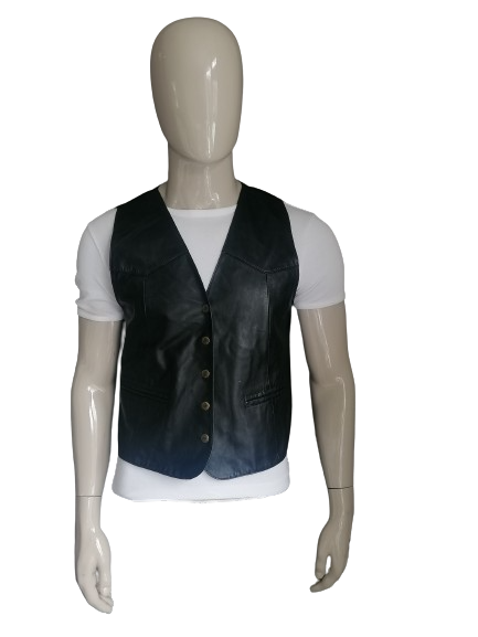 Fashion studio leather waistcoat with press studs. Black colored. Size M.