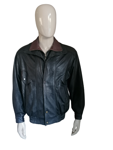 Vintage 80er-90er-Jahre-Lederjacke mit Doppelverschluss. Braun Schwarz gefärbt. Größe L/XL.