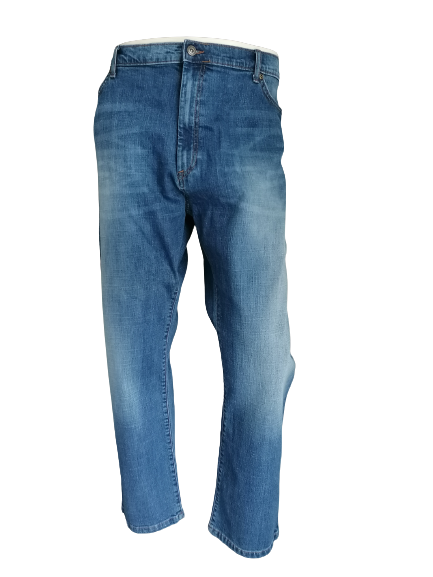 Vaqueros M&S (Marks & Spencer). De color azul. Cónico. Tamaño W44 - L30. Estirar.